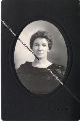 Woman In Dark Ruffled Dress, Possibly Nellie McCloud