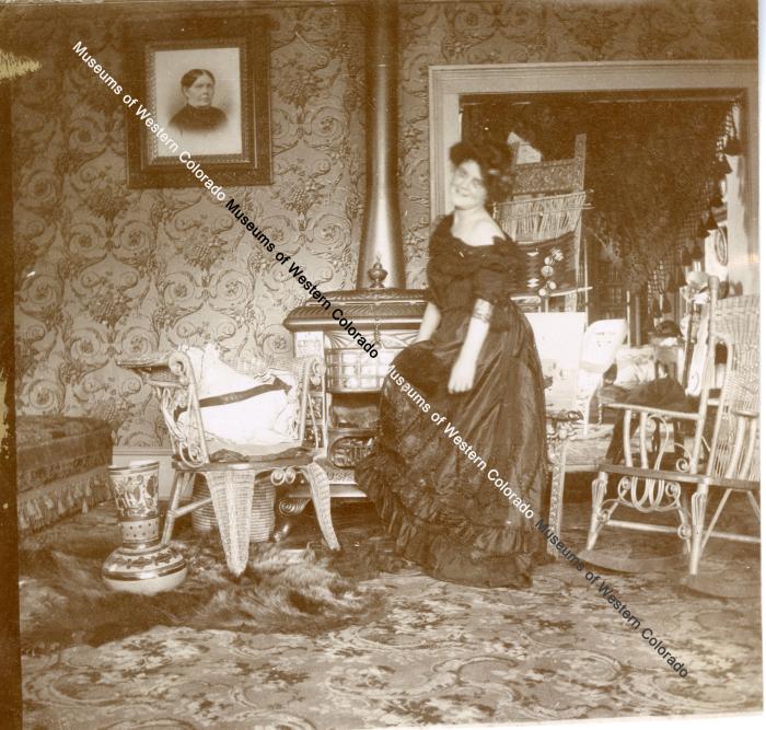 Interior View with Lady In Evening Dress, possibly Nellie McCloud