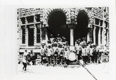 Teller Institute Band in Doorway of Grand Valley National Bank