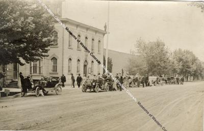 Early Automobile Tour in Town