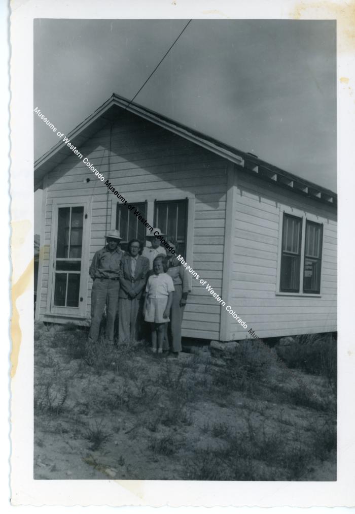 Group in front of house