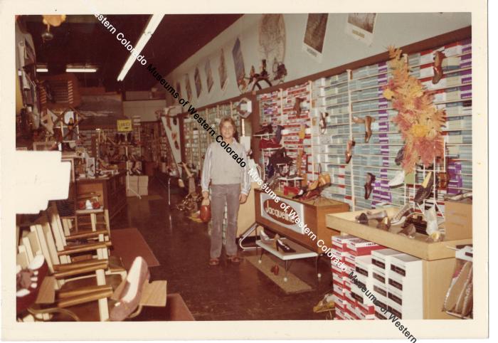 Man in Benge's shoe store