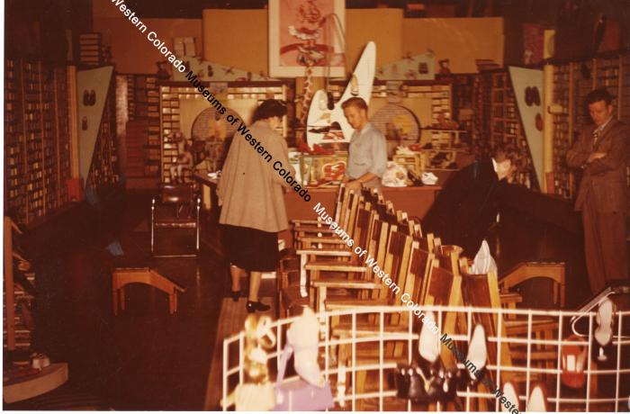 Shoppers in Benges shoe store