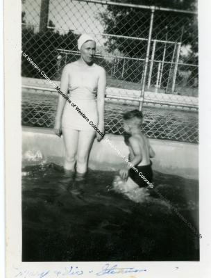 Photo of boy and woman at the pool