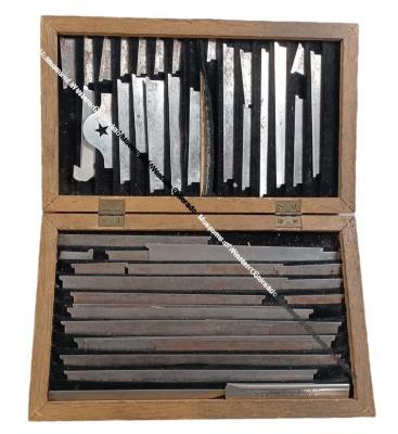 Box of "make up" rulers and razors