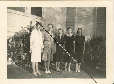 Five ladies in front of the church