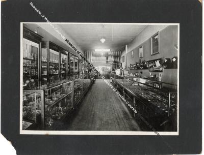 Black and white photo of interior of Sherman's Jewelry store