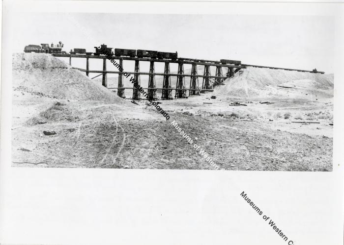 Photo of D&RG work train. Notes say The train could be on the North Fork branch near Hotchkiss, CO.