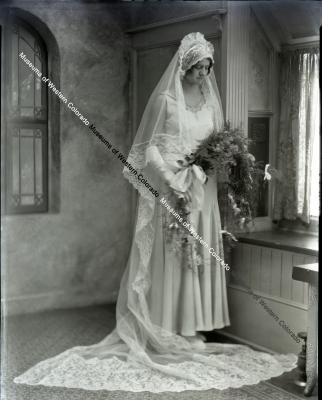 Negative of women in wedding dress