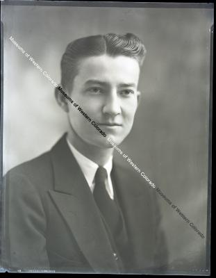Negative of young man in suit