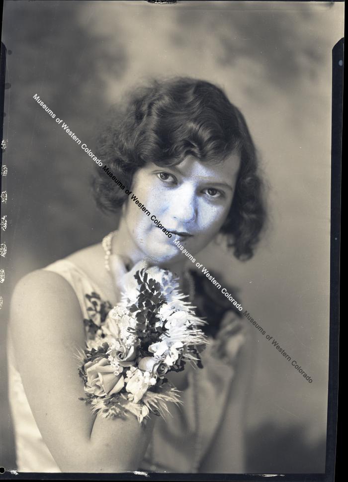 Negative of young lady in dress