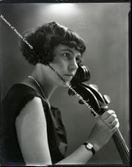 Negative of young lady with Cello