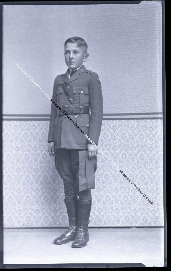Negative of Little Boy in Uniform