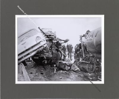 Photo of automobile and semi truck crash
