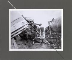 Photo of automobile and semi truck crash