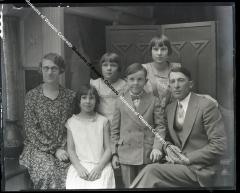 Negative of a family (Mom, Dad, Son, Three girls)