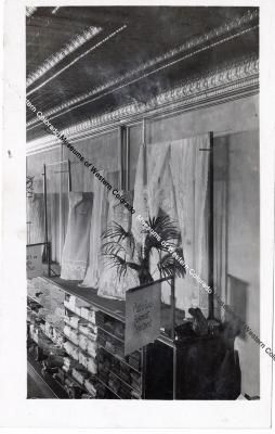 Photo and negative of Fair Building, interior with curtains
