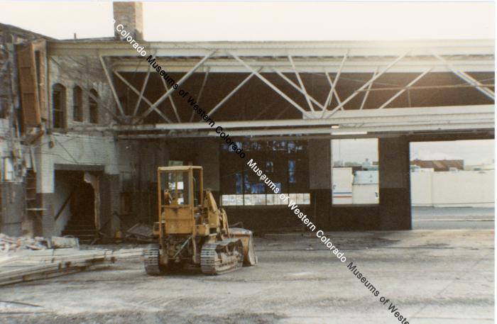 Color Photo of the demolition of Western Slope Auto