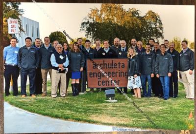 Archuleta Engineering Center sign and group of people