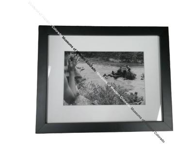 Black and white photo of people rafting