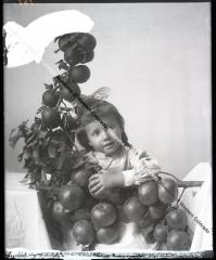 Photo of a girl and her apples