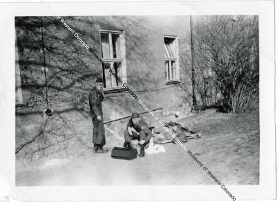 Two Soldiers in Front of Building