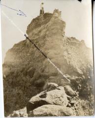 Rocky Spire with Woman Standing on Top