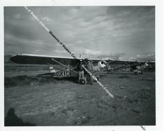 Two survey single engine airplanes on ground AEC Section at Walker Field, Grand Junction, CO +1 copy