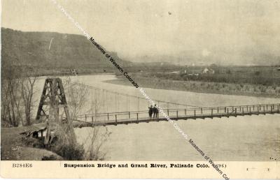 Photo of a Suspension Bridge and Grand River