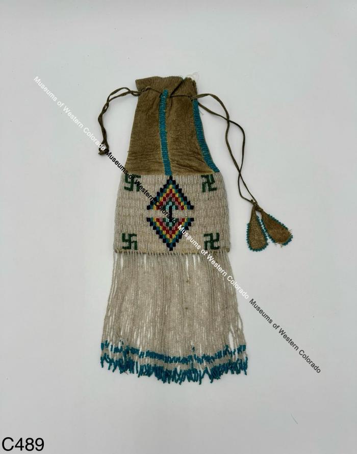 Ute Beaded Pouch with White Tassels and Swastika decoration