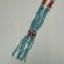 Blue Beaded Necklace with Red and White Decoration