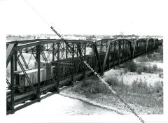 Coal train on Colorado river bridge   