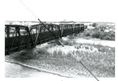 Coal train on Colorado river bridge  