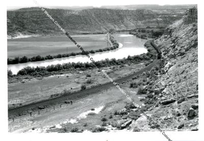 Mill Tailings train below the cliffs of Orchard Mesa 