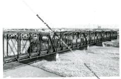 Mill Tailings train on Colorado river bridge 