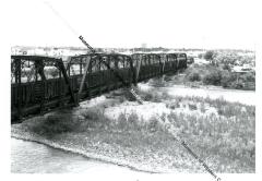 Coal train on Colorado river bridge  