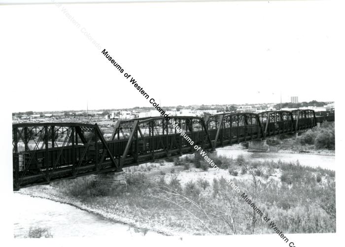 Coal train on Colorado river bridge   