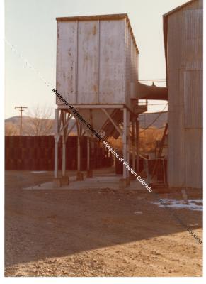 Silo with drums in background